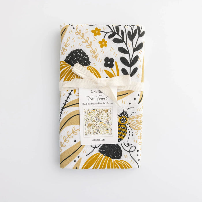 tea towel with illustrated bees and floral elements