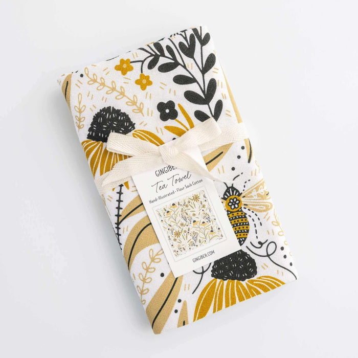 tea towel with illustrated bees and floral elements