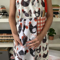 Chicken Apron & Tea Towel—bake in style with gingiber apron featuring chicken illustrations and matching tea towel, adjustable neck strap, large pocket, 100% cotton canvas