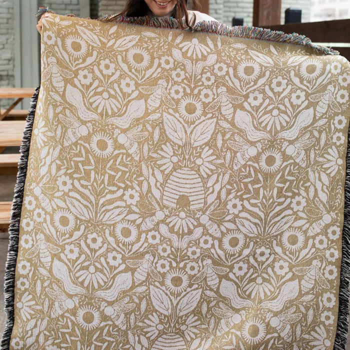 Blanket - woven throw featuring gold bee and beehive illustrations