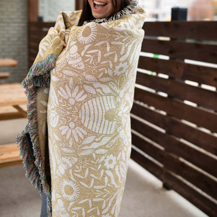 Blanket - woven throw featuring gold bee and beehive illustrations