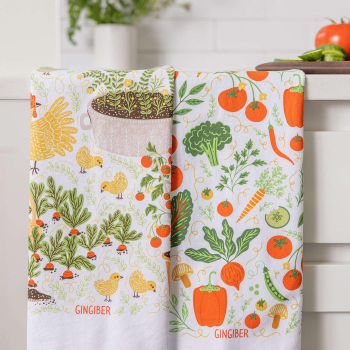 tea towel bundle with illustrated vegetables, chickens, and garden details