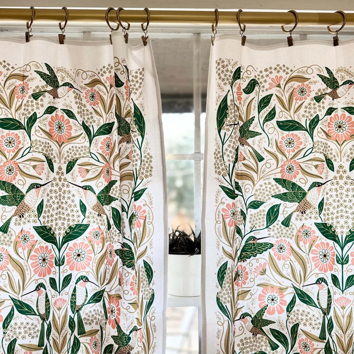 set of two tea towels with bird and floral illustrations