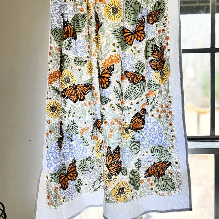 set of two tea towels with butterfly and floral illustrations