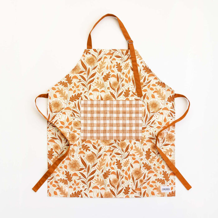 Mushroom Medley Apron—bake in style with gingiber apron featuring mushroom print, adjustable neck strap, large pocket, 100% cotton canvas