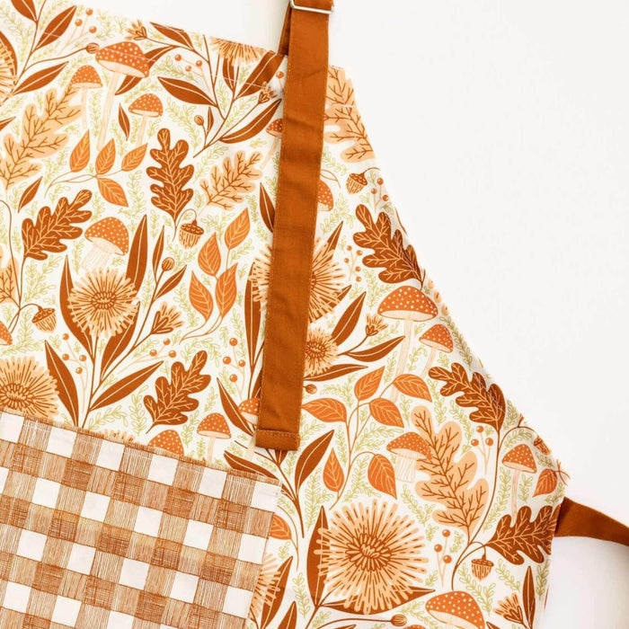 Mushroom Medley Apron—bake in style with gingiber apron featuring mushroom print, adjustable neck strap, large pocket, 100% cotton canvas